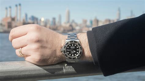 rolex submariner black on wrist